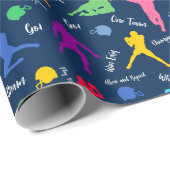 Muster der Silhouetten des Fußballspielers auf bla Geschenkpapier (Rolleneckpunkt)