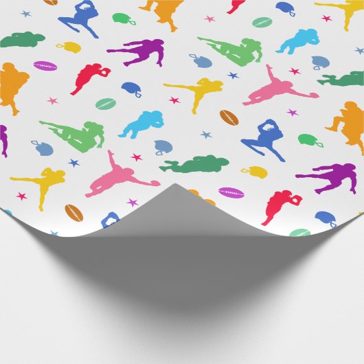 Muster farbenfroher Fußballspieler auf Weiß Geschenkpapier (Ecke)