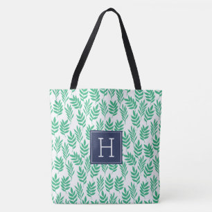Muster für grüne Blätter und blaue Monogramme Tasche