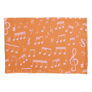 Muster für niedliche rosa und orange Musiknoten Kissenbezug