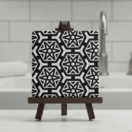 Muster für schwarze und weiße Sterne und Hexagons Fliese