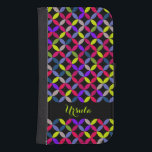Muster helle Farbname Mädchen Klappkoffer Phone Geldbeutel<br><div class="desc">Eine kühn grafische bunte Quarter gemusterte Klapphandy Gehäuse. Personalisieren Sie dieses Element mit Ihrem Namen. Dieses Beispiel liest Ursula. Heller Mix aus Pop,  kräftig und schwarz,  mit Rosa,  Kalkgrün,  Blau,  Braun und lila. Entworfen von Sarah Trett.</div>