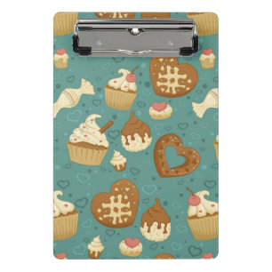 Muster mit kleinen Kuchen und Süßigkeiten Mini Klemmbrett
