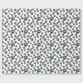 Muster mit schwarzen Schädeln auf weiß Geschenkpapier (Flach)