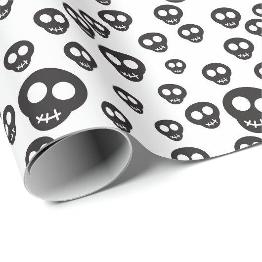 Muster mit schwarzen Schädeln auf weiß Geschenkpapier (Rolleneckpunkt)