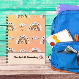 Muster Rainbows auf gelben Notebooks Notizblock