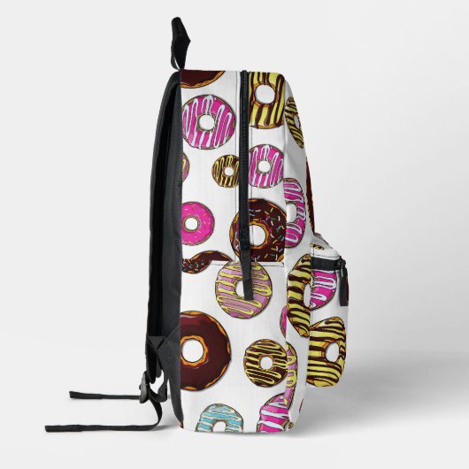 Muster von Donuts, farbenfrohe Donuts, Sprinklen Bedruckter Rucksack (Links)