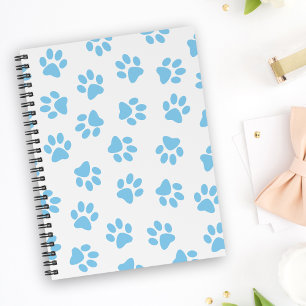 Muster von Pfoten, Hundeschäben, blaue Baby-Paws Planer