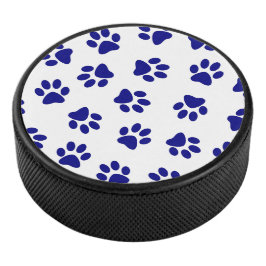 Muster von Pfoten, Hundeschäften, blaue Navy-Paws Eishockey Puck