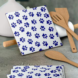 Muster von Pfoten, Hundeschäften, blaue Navy-Paws Fliese