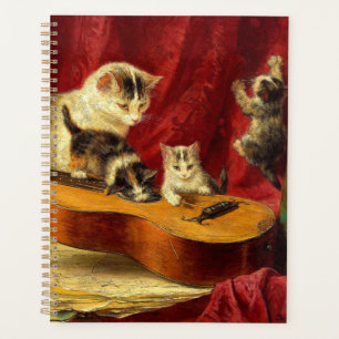 Mutter Katze und Kätzchen spielen mit Gitarre Planer