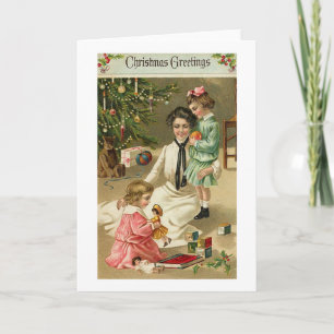 Mutter, Mädchen und Spielzeug zu Weihnachten
