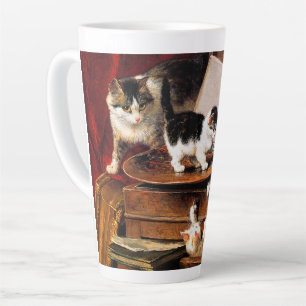 Mutterkatze und Kätzchen am Tisch Milchtasse
