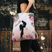 Muttertagsfrauen, die ein Kind halten Tasche