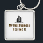 My First Business Keychain – I Earned It – Proud F Schlüsselanhänger<br><div class="desc">Celebrate the pride of launching your very first business! This keychain features the bold phrase "My First Business – I Earned It", perfect for anyone who worked hard to achieve this milestone. Whether it’s a startup, small business, or entrepreneurial venture, this keychain is a fun and meaningful reminder of dedication...</div>