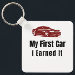 My First Car Keychain – I Earned It – Proud First  Schlüsselanhänger<br><div class="desc">Celebrate the pride of owning your very first car! This stylish keychain features the bold phrase "My First Car – I Earned It", perfect for anyone who worked hard to achieve their dream. Whether it's your first vehicle, a milestone purchase, or a gift for someone who just got their first...</div>
