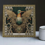 Mystical Hummingbird Tribal Jewel Tribute Fliese<br><div class="desc">Treten Sie ein in ein Reich, in dem sich physische und spirituelle Konvergieren mit unserem sorgfältig gestalteten 'Mystische Hummingbird Stammestall Jewel Keramik Tile'. Inspiriert durch eine Kombination von einzigartigen Kunststilen - Stammesästhetiken, Glückscore-Optimismus, Teppichpunk-Rebellion und symmetrischer Harmonie, schwingt diese Kachel mit einer reichen visuellen Erzählung. Das Kernmotiv besteht aus einem Kolibri,...</div>