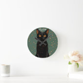 Mystische schwarze Katze mit orangefarbenen Augen Runde Wanduhr (Zuhause)