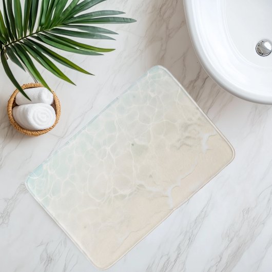 Nachahmung des Strandsandes unter klarem Wasser im Badematte