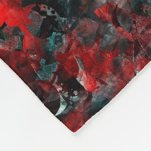 Nacht mit ausgestrahlten roten Blätter, die auf As Fleecedecke (Ecke)