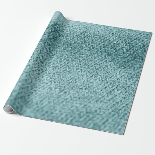 Nah aus grün gestricktem Hintergrund. Geschenkpapier (Ungerollt)