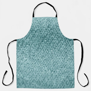 Nah aus grün gestricktem Hintergrund. Schürze