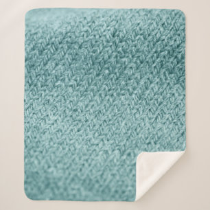 Nah aus grün gestricktem Hintergrund. Sherpadecke