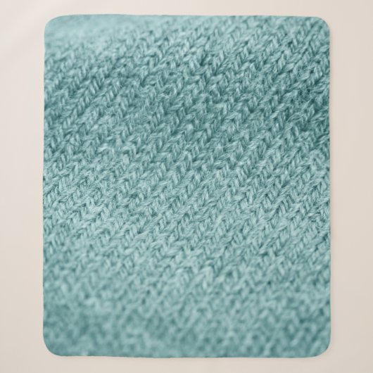 Nah aus grün gestricktem Hintergrund. Sherpadecke (Vorderseite)