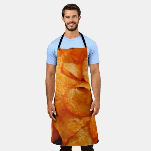 Nah aus saftig, knusprig, Pommes frites auf schwar Schürze (Getragen)