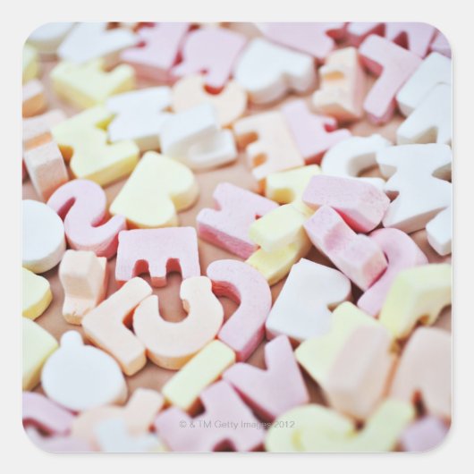 Nah oben vom vibrierenden Süßigkeitsalphabet Quadratischer Aufkleber (Vorderseite)