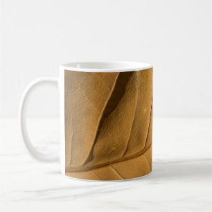 Nah-up abstrakte Trockenblattstruktur Hintergrund Kaffeetasse