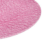 Nah-up rosa Leder, texturierter Hintergrund. Schneidebrett (Ecke)