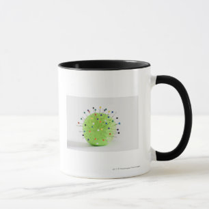 Nahaufnahme der geraden Buttone eingefügt in einen Tasse