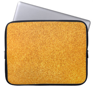 Nahaufnahme der goldenen mattmetalltextur. Glänzen Laptopschutzhülle