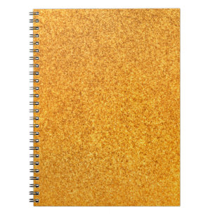 Nahaufnahme der goldenen mattmetalltextur. Glänzen Notizblock