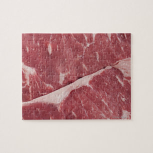 Nahaufnahme des rohen Steaks Puzzle