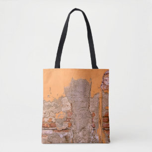 NAHAUFNAHME EINER ORANGE-GRAUEN WANDFARBE TASCHE