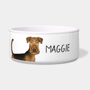 Nahaufnahme eines Airedale Terriers mit individuel Napf