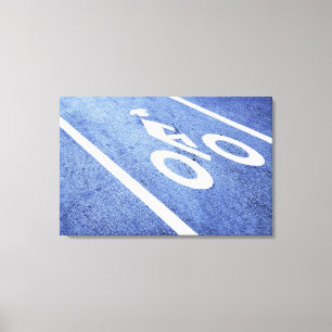 Nahaufnahme eines Fahrradzeichens auf der Straße Leinwanddruck