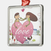 Nahaufnahme eines Paares, das ein Herz hält, Silbernes Ornament (Links)