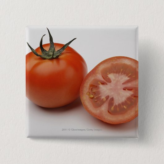 Nahaufnahme von zwei Tomaten Button (Vorderseite)