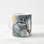 Nahaufnahme-Zoe-Katze, die Tasse zeichnet (Vorderseite Links)