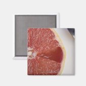 Nahe Orangenscheibe und Löffel Magnet (Vorderseite/Rückseite)