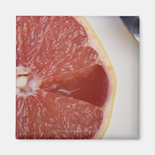 Nahe Orangenscheibe und Löffel Magnet (Vorne)