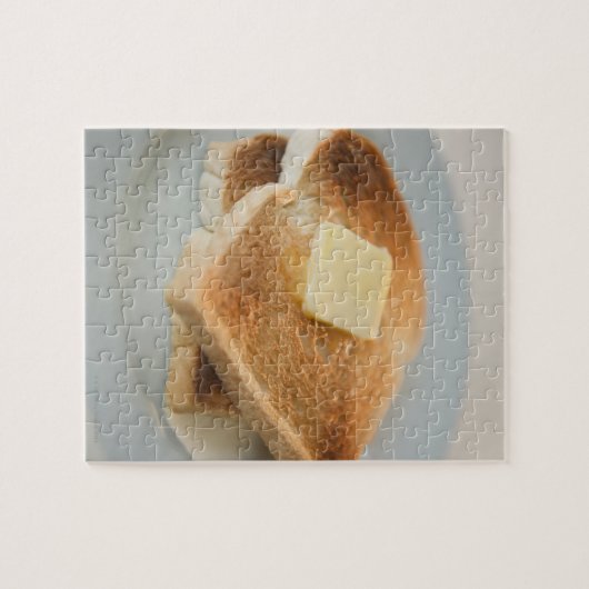 Nahe Toasten mit Butter auf Teller Puzzle (Horizontal)