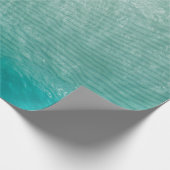 Nahes Foto aus grünem Stoff Geschenkpapier (Ecke)