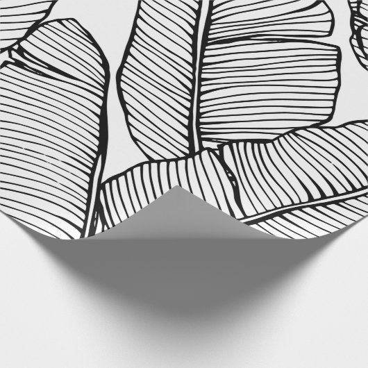 Nahtlose Bananenblattmuster im Hintergrund. Schwar Geschenkpapier (Ecke)