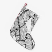 Nahtlose Bananenblattmuster im Hintergrund. Schwar Kleiner Weihnachtsstrumpf (Vorderansicht (hängend))