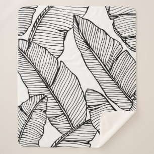 Nahtlose Bananenblattmuster im Hintergrund. Schwar Sherpadecke