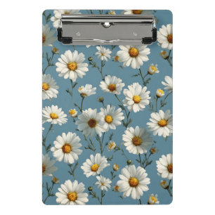 Nahtlose Daisy-Blume-Muster auf blau Mini Klemmbrett